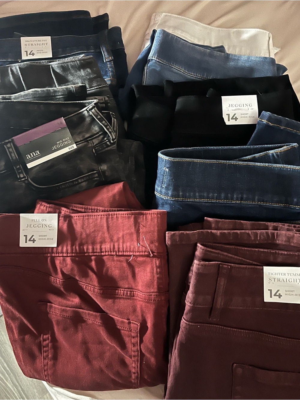 Lot of 9 pairs of jeans. 8 are from Lane Bryant. NWT and NWOT.